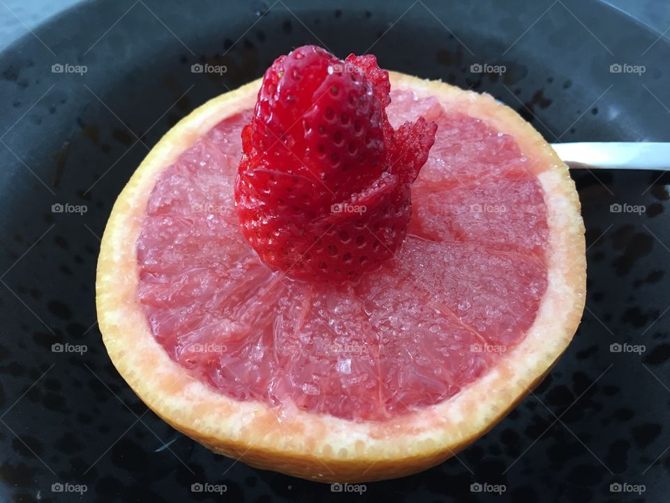 Grapefruit with a Rose Cut Strawberry 