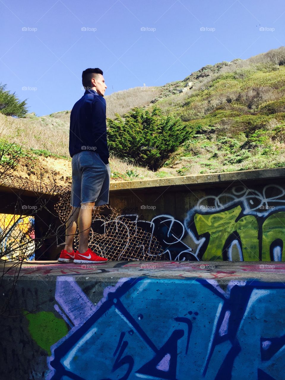 Low angle view of smart man standing