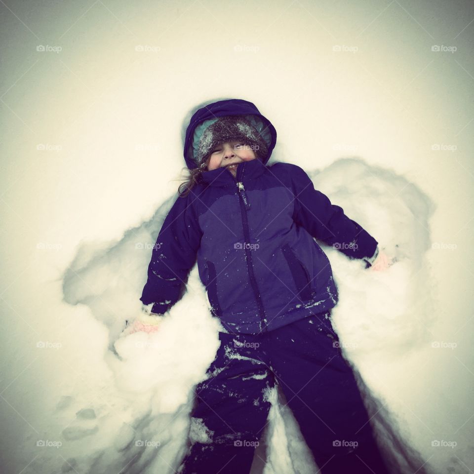 Snow Angel. Snow brings cold but family brings warmth