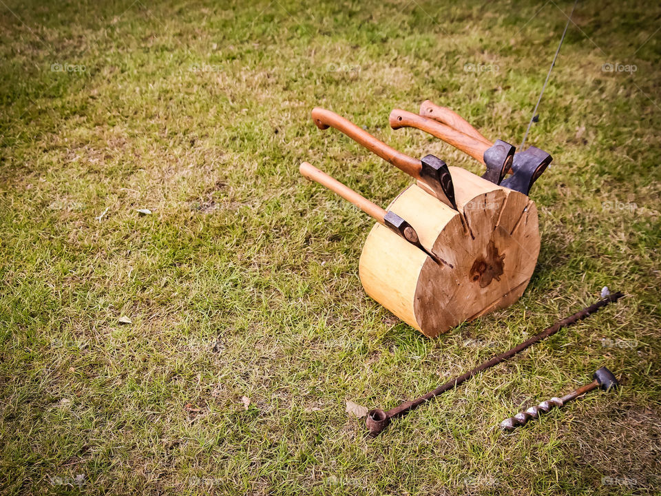 abstract looking camping equipment. Vintage axes and camping tools