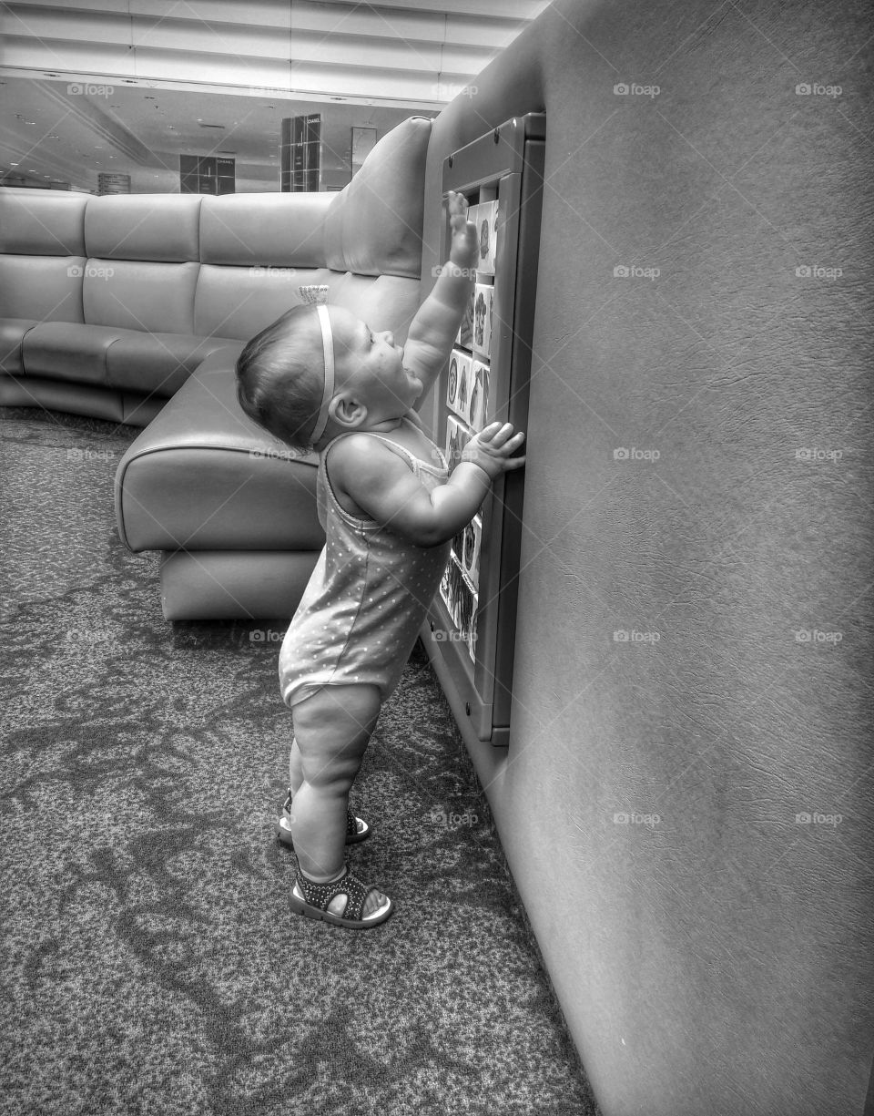 reaching high, playing. daughter playing