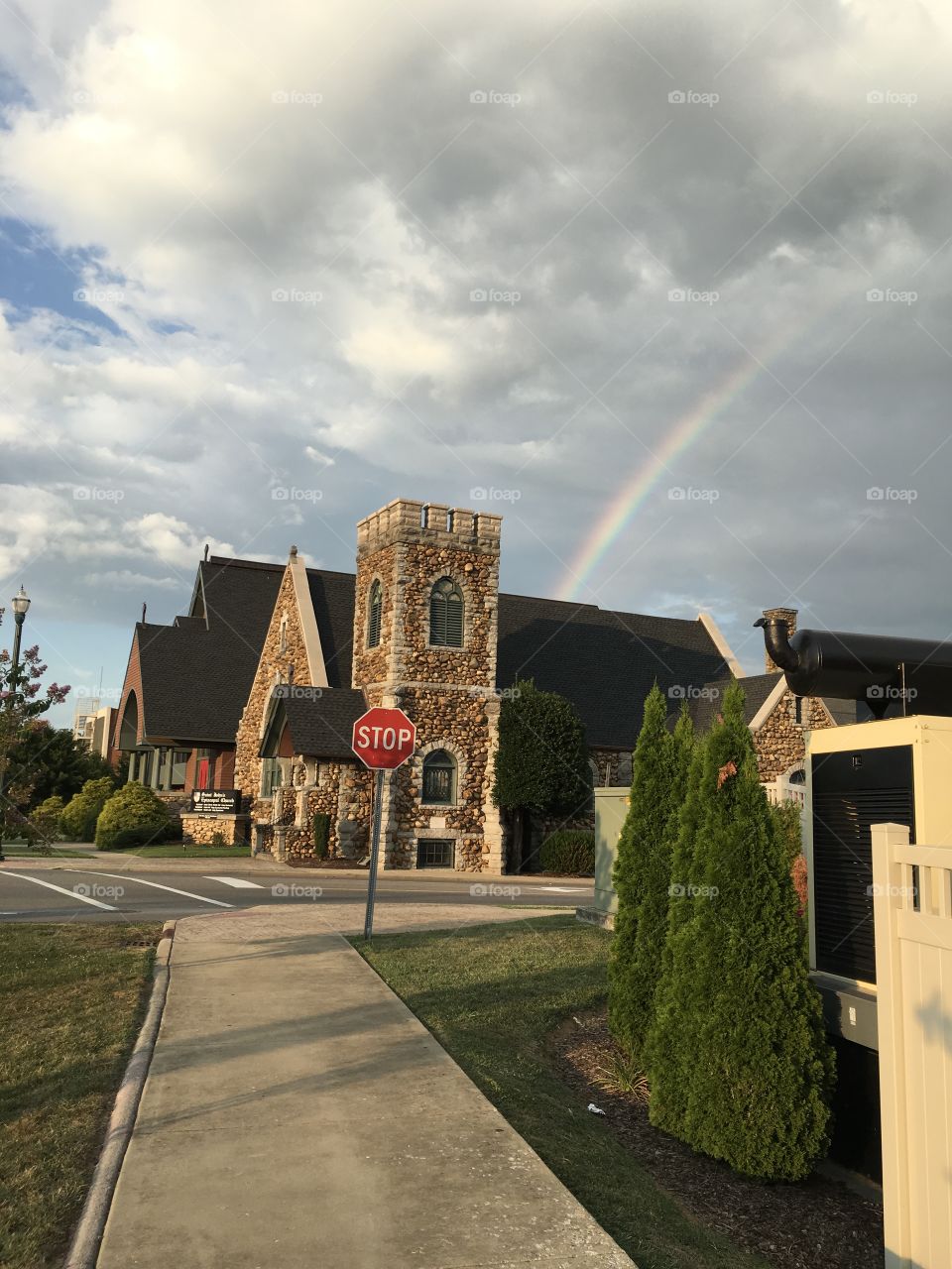 Rainbow near a church