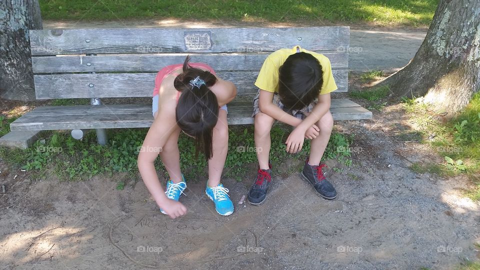 grumpy children waiting quasi patiently