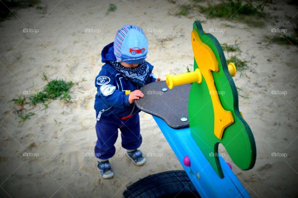 little boy on the playground