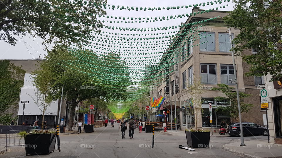 Sainte Catherine street decorated by the work of art by Claude Cormier. Montreal, Québec, Canada.