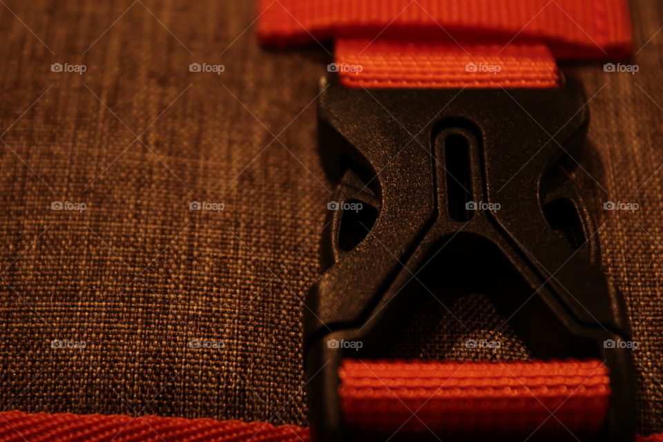 Grey and orange travel organizer clasp close-up