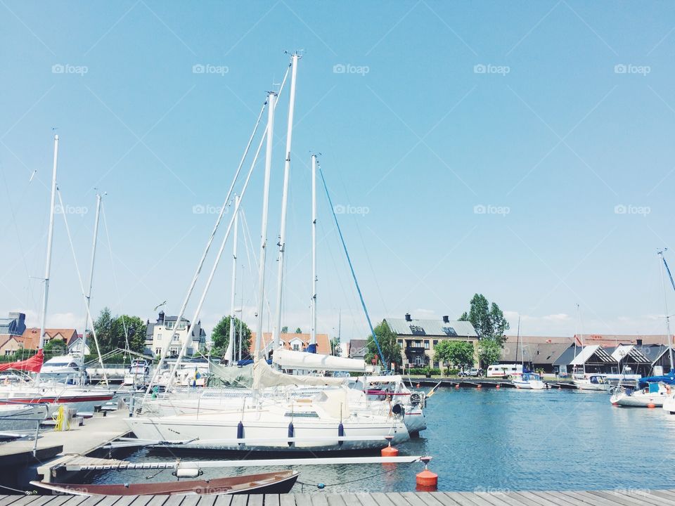 Harbor with boats on a summerday in Ahus Sweden