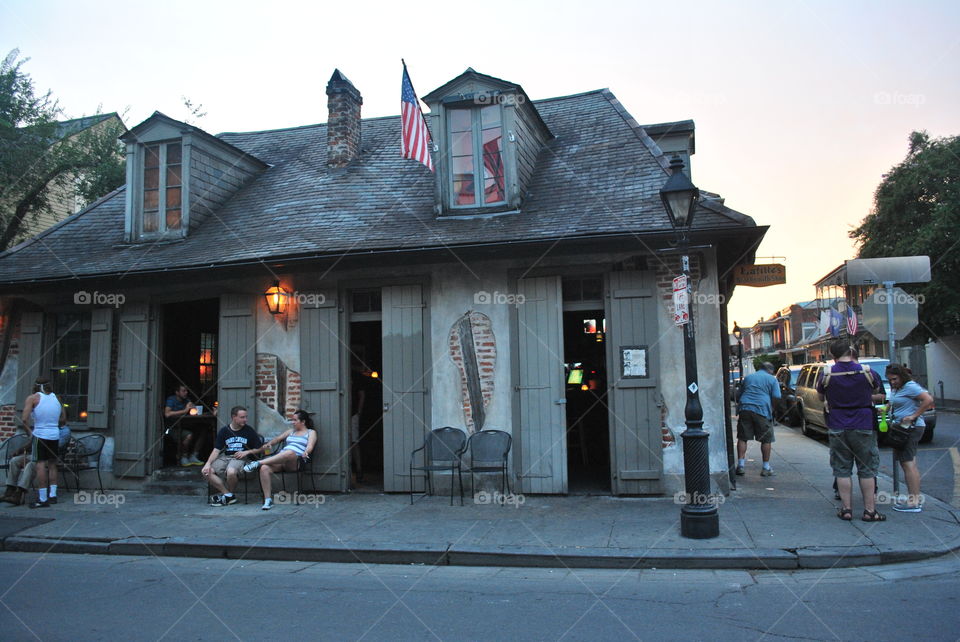 People hanging out at a bar outside in New Orleans, La