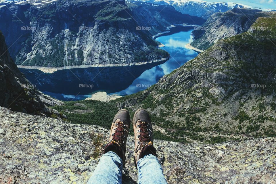 Hiking boots high above Trolltunga 