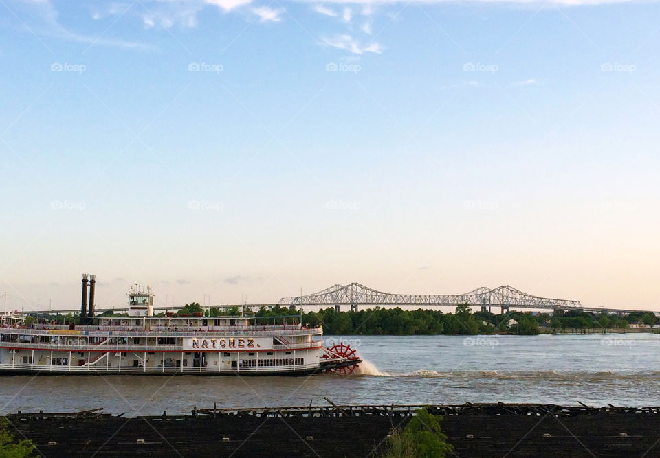 After climbing the bridge at Crescent Park in New Orleans I was greeted by the steamboat Natchez. What perfect timing, I caught her right in front of the bridges. 