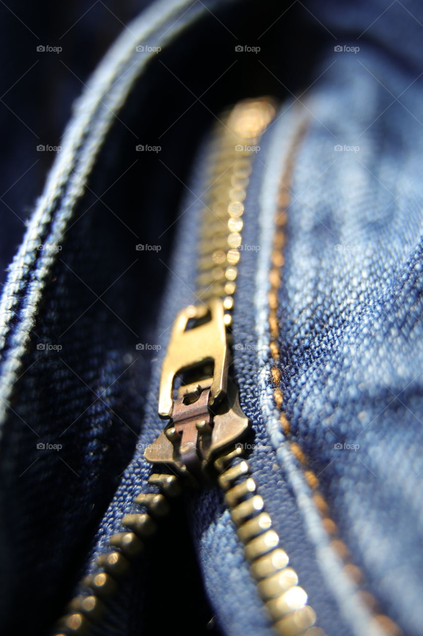 Zipper on blue jeans 