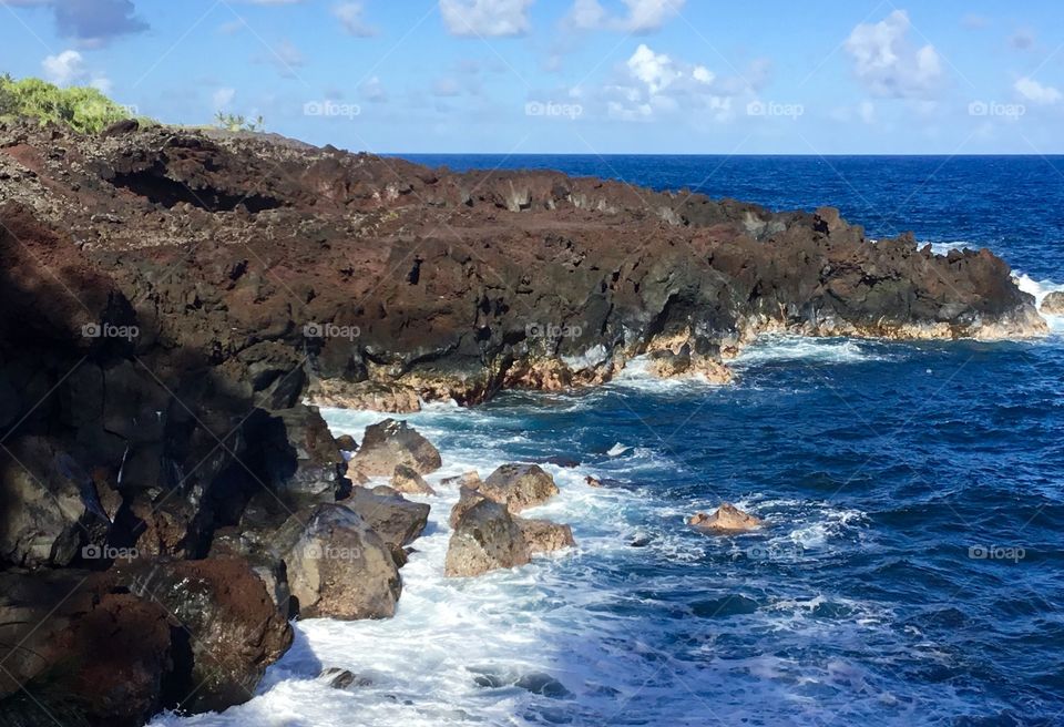 Blue skies, waves, and lava