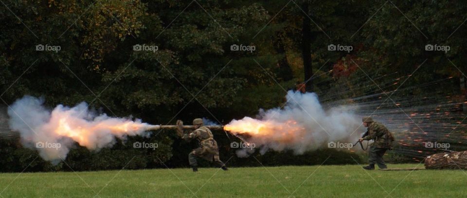 soldier firing rocket, reenactment