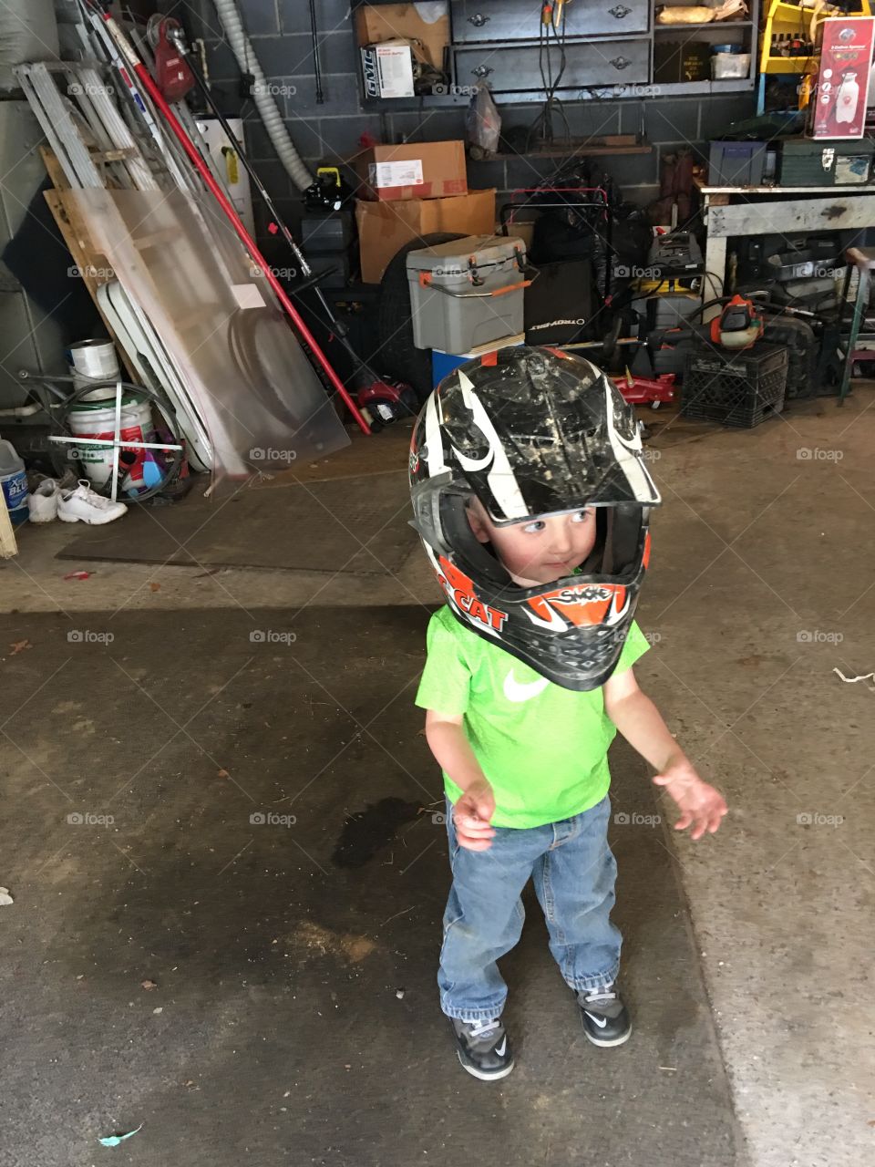 Got daddy’s helmet on