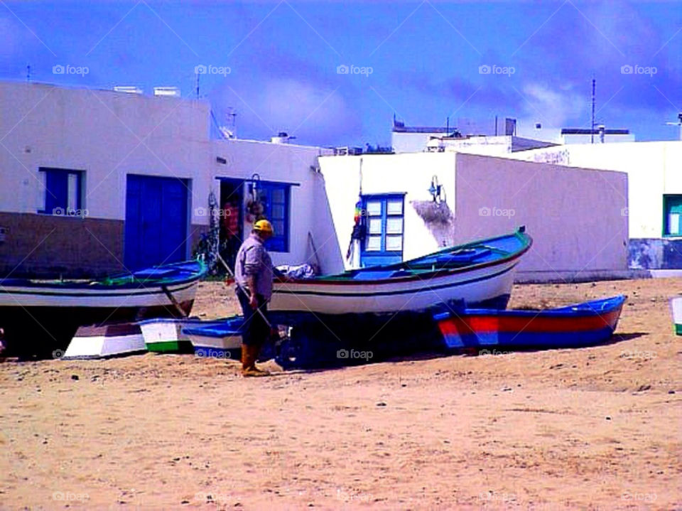 beach boats work village by merethe