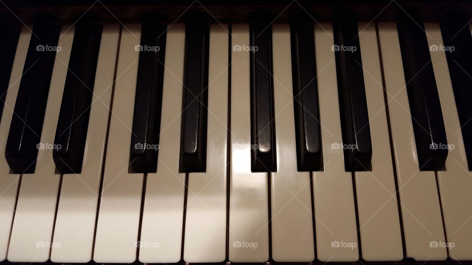 Piano Keys. I st led upon an old piano.