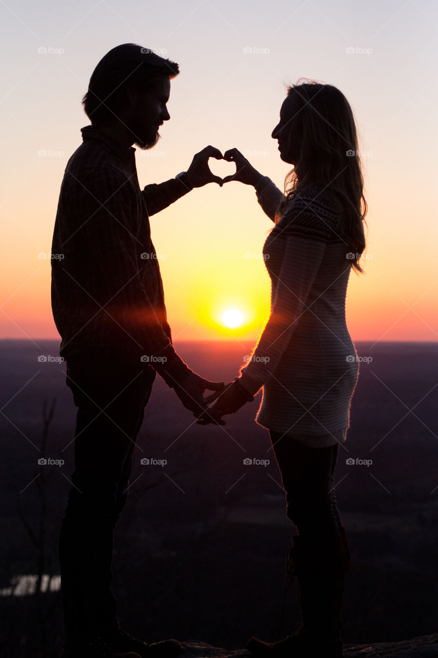Hearts in Hand at Sunset