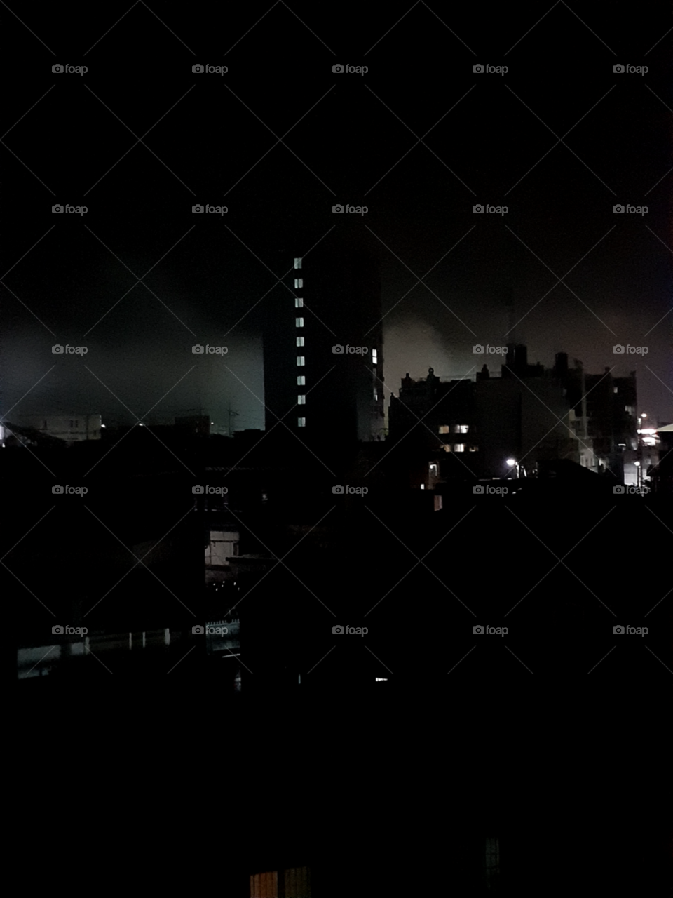 This is the pictures of night after the rain. you can see the fog around in every houses. its quite visible because of the lights. you can see also the shadow of the buildings and the houses around it. its really a dark night but i love its sight.