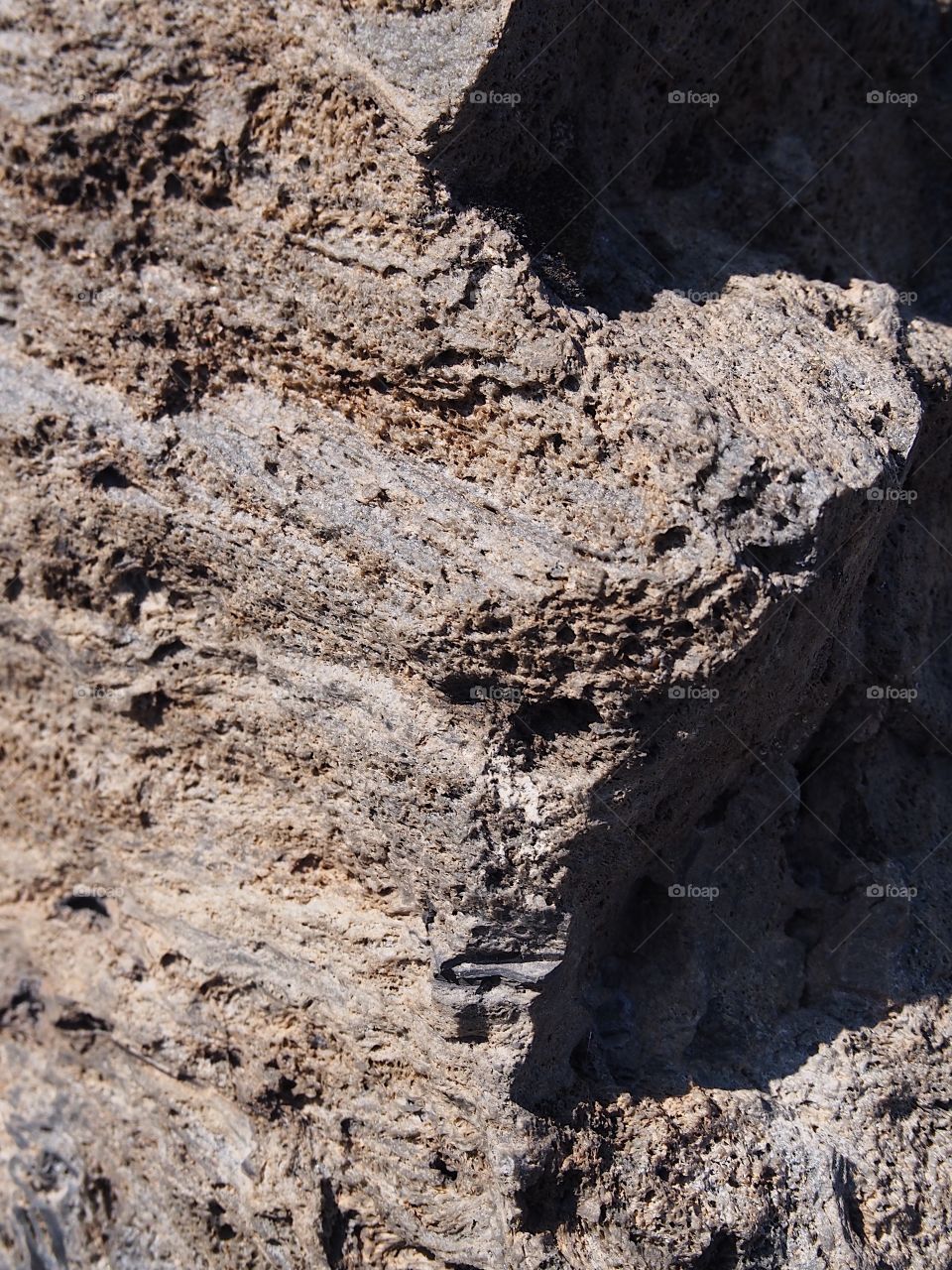 The rugged terrain of the jagged rocks at the Big Obsidian Flow in the Newberry National Volcanic Monument in Central Oregon in the fall. 