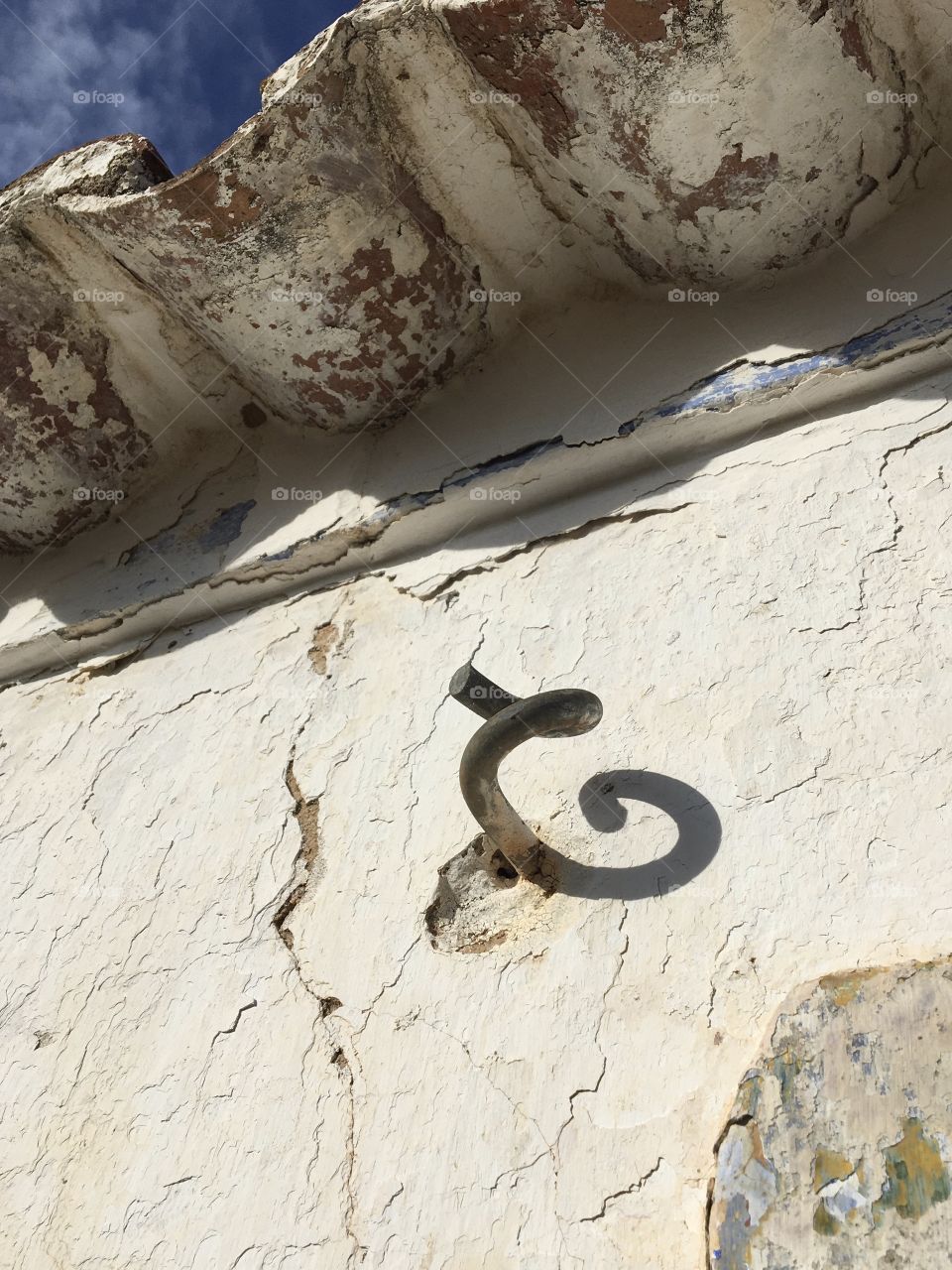 Strong shadow on an old wall