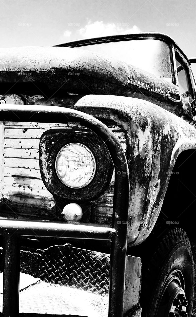 Silhouette of a old rusted truck