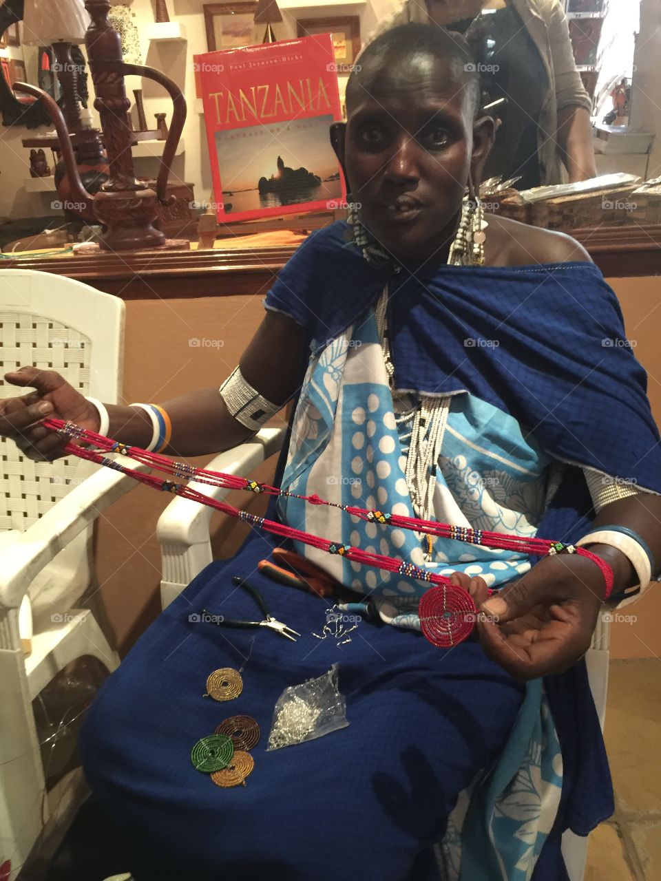 Masai artist making jewelry