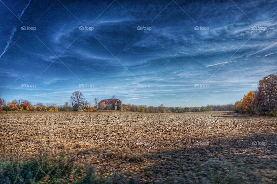 Dry land against blue sky