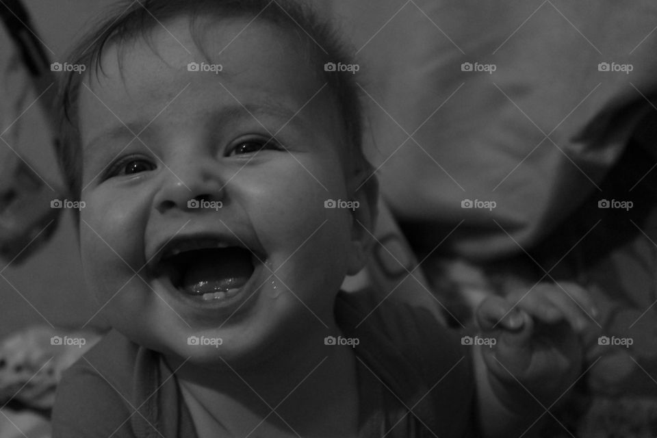 the child is smiling. children's laughter. first teeth