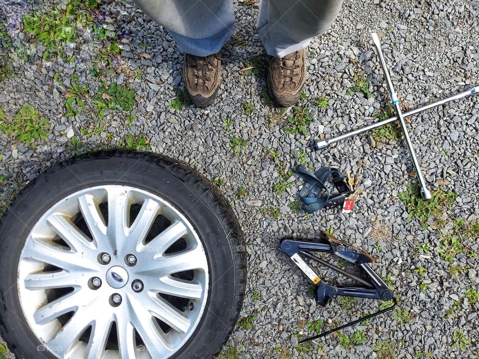 From where I stand!
Changing the tires.