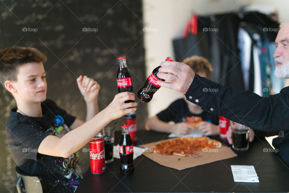 Happy time together. Guys. Tasty Coca-Cola 