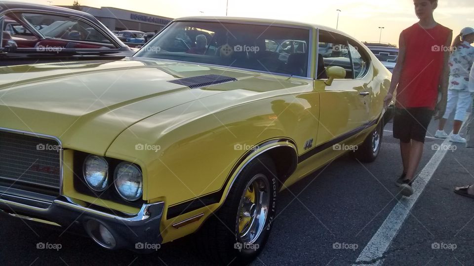 Yellow Oldsmobile