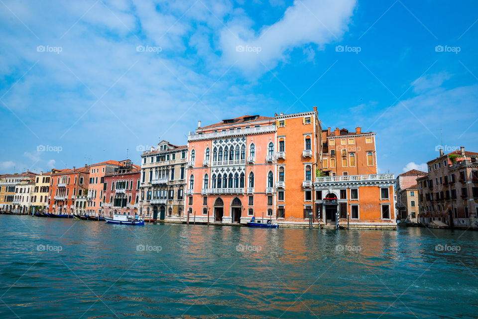 View of houses by a canal venice