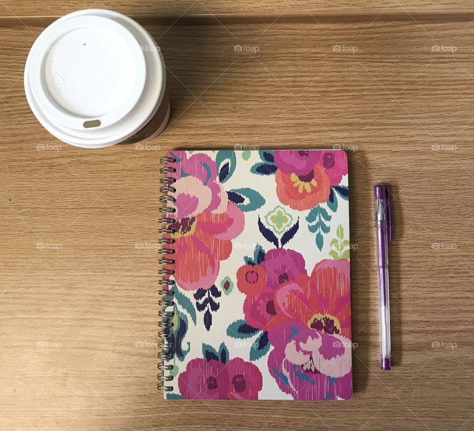 Notebook, pen, and coffee 