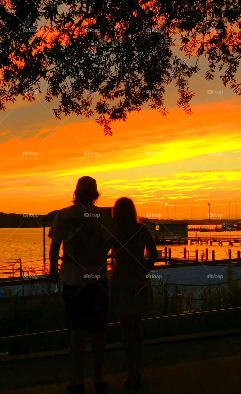 The sky was filled with the most brilliant orange complimented perfectly with hues of gold, yellow, red and crimson. An orange haze had casted over the water, reflecting off every wave. Finally,the sun disappears along with the shine. I can only wait to see another magical moment of beauty and warmth! I can only wait for another sunset! Enjoy!