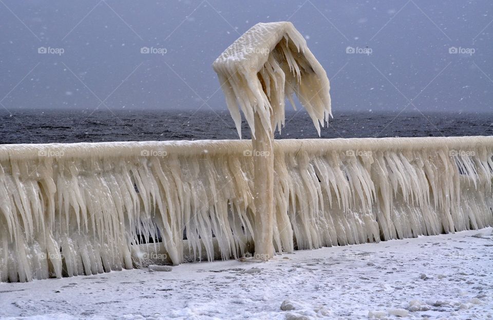 frozen pier in Gdynia, Poland. after winter storm