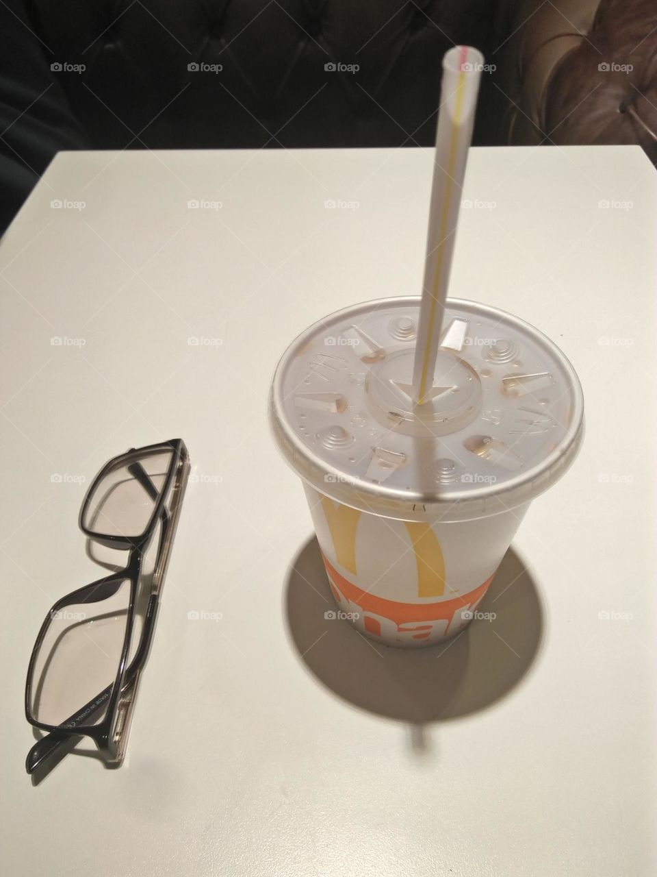 Cup of cocacola and glasses