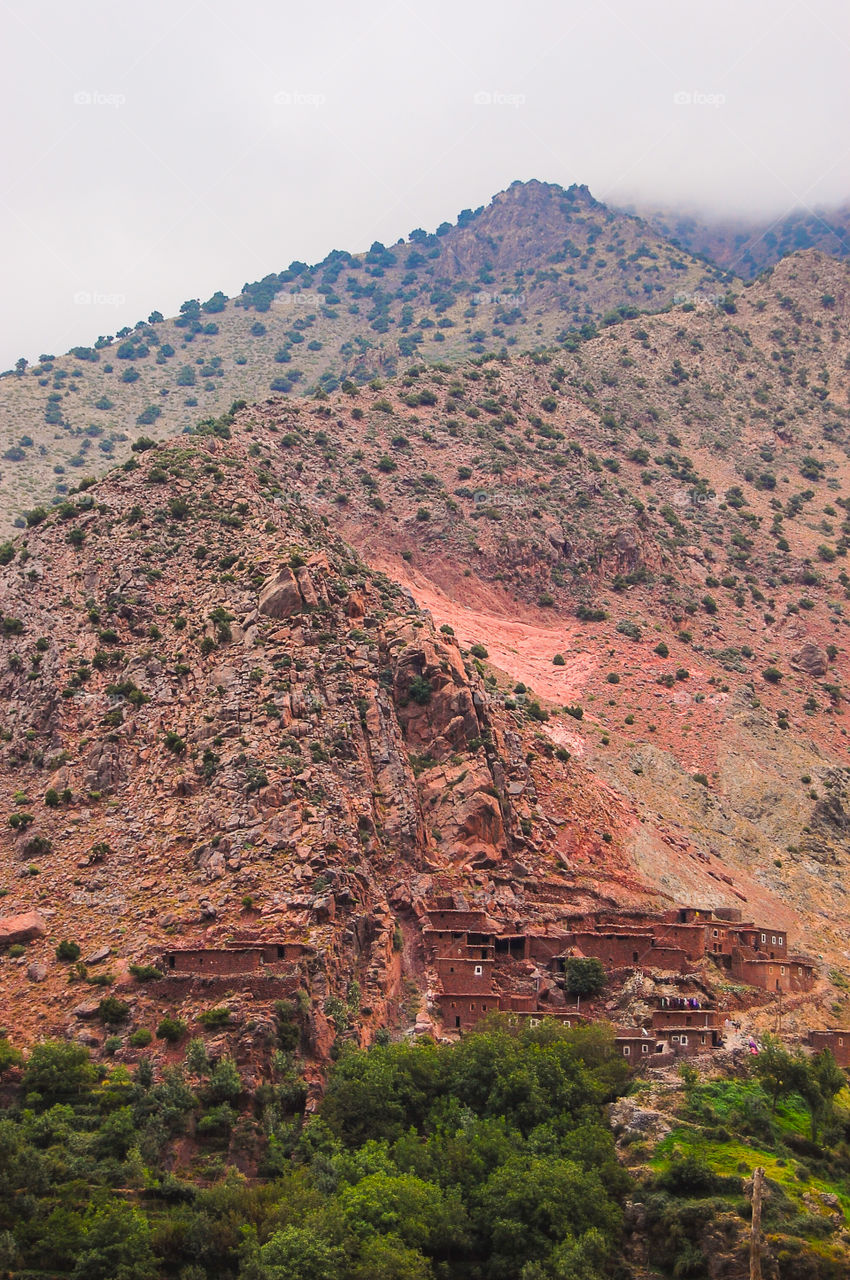 Village carved in the mountains . Clay coloured village