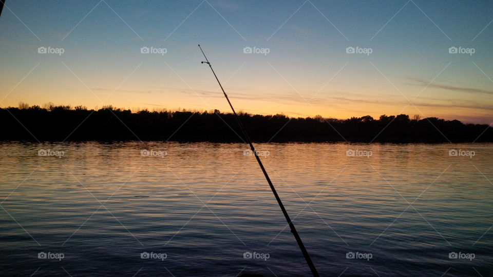summer fishing, river at the sunset, Danube in the evening, silent at the river, summer sky,