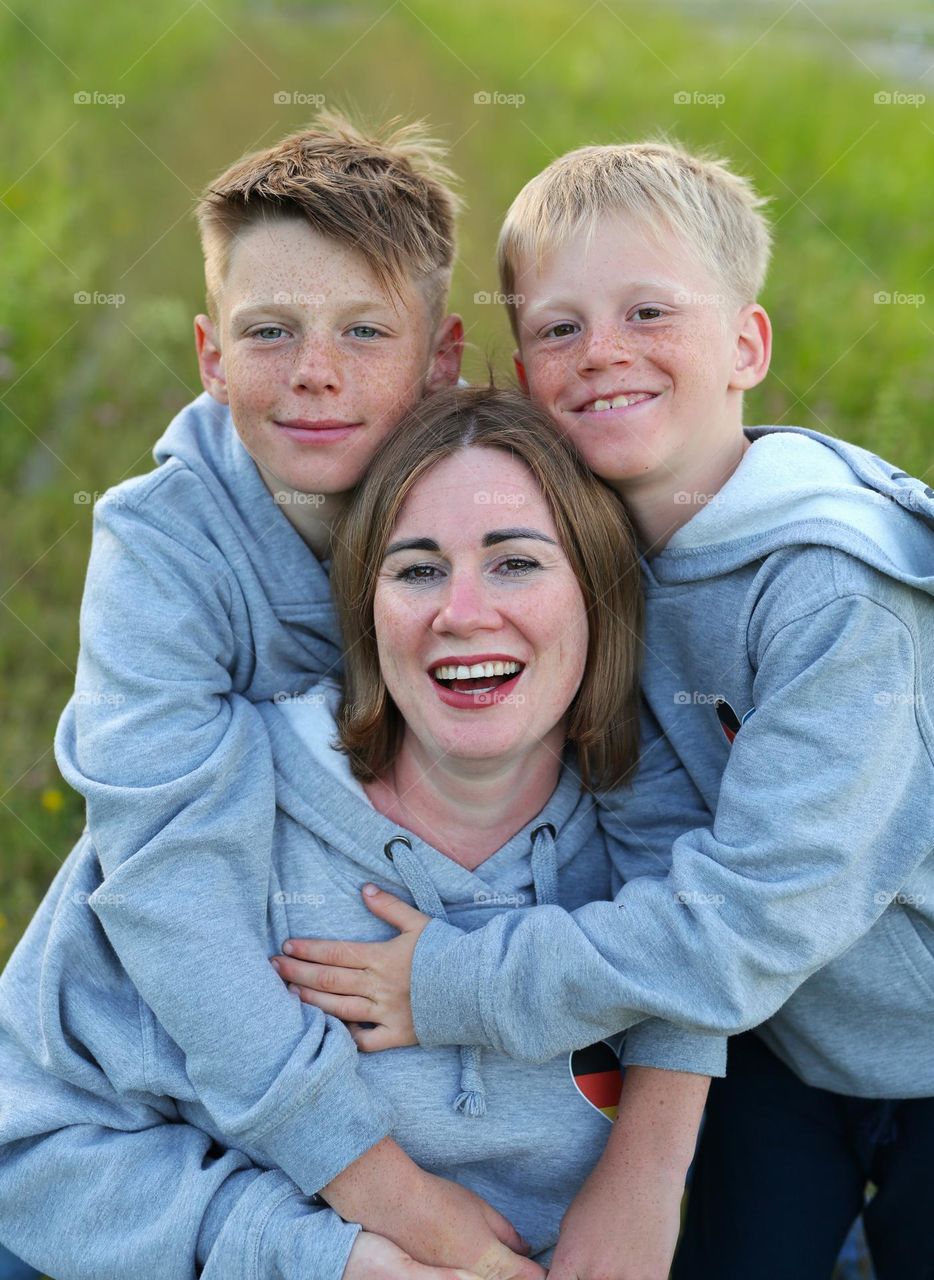 Happiest family, cute mother and sons 