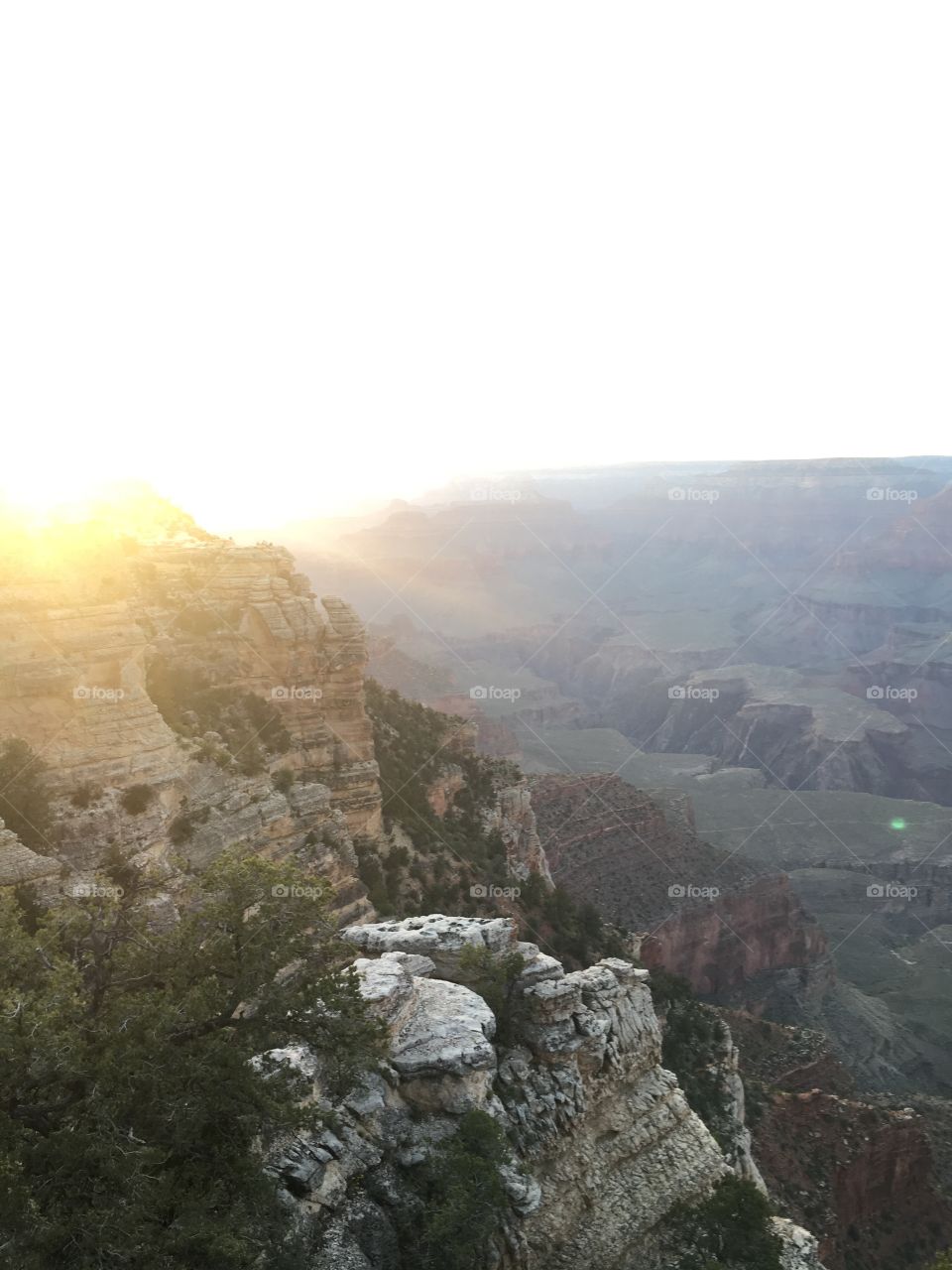 Sun going down behind the canyon 