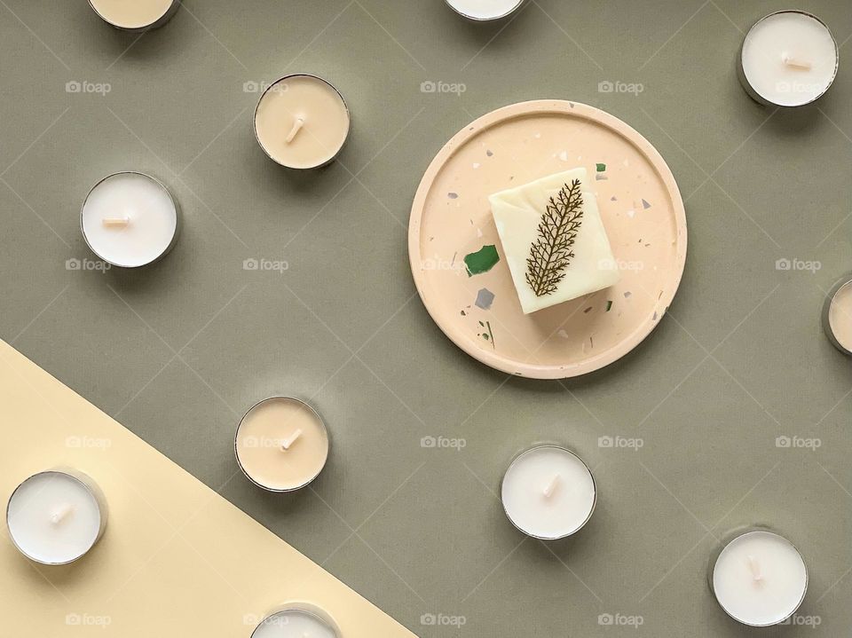 Eco pattern: concrete stand, candles, natural soap