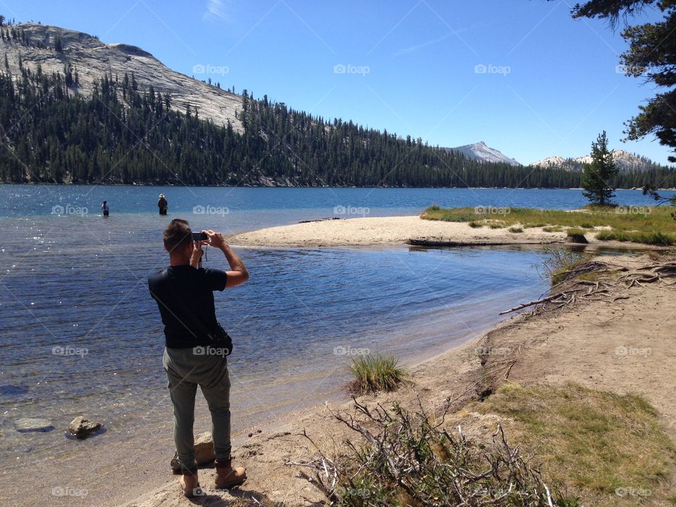 Man takes a Photo of the river