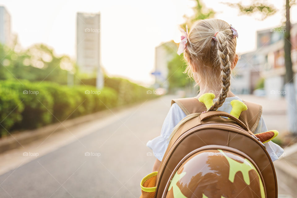 Pupil girl going to school 