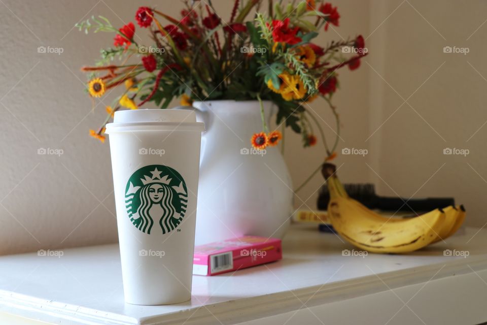 Starbucks cup of coffee on a table