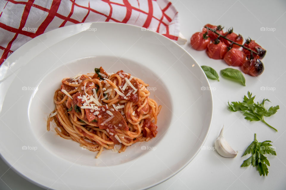 High angle view of pasta near napkin