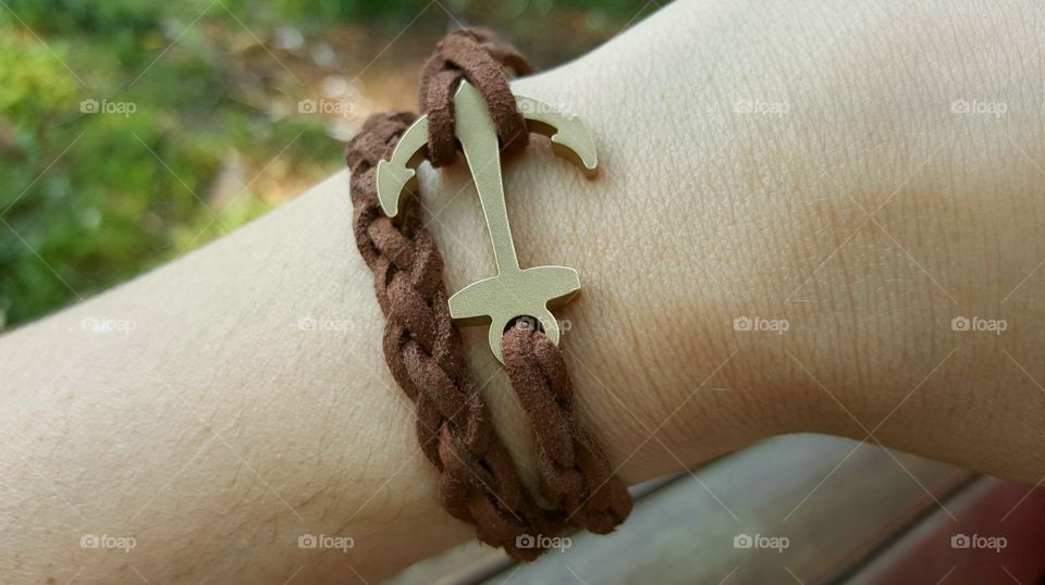 Suede bracelet with a brass anchor