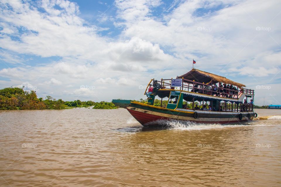 a ferry boat at the Tonle Sap Lake in the Province of Siem Reap near Angkor in Cambodia Southeast Asia