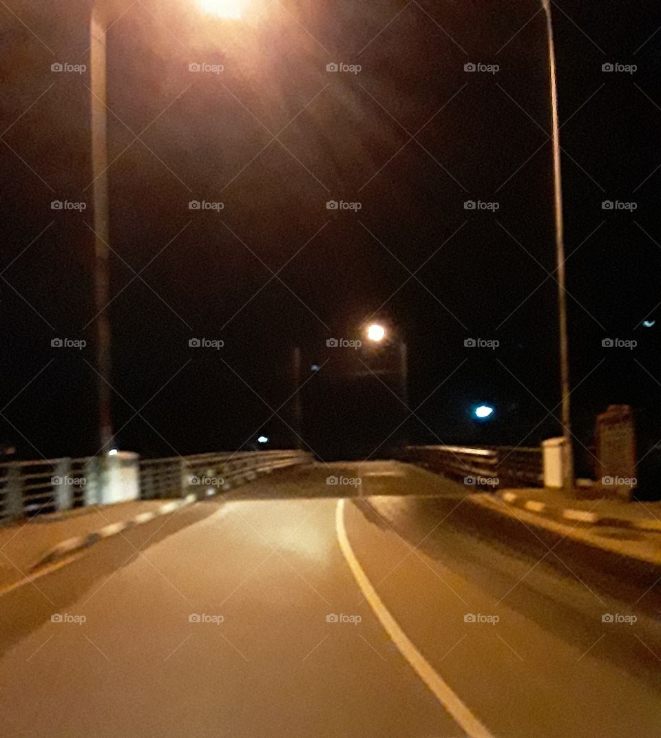 Road,  the road  that  was black in the day time  just melted into the  darkness of the night