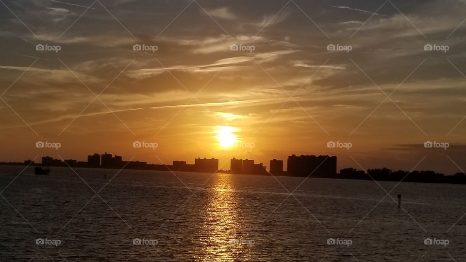 orange sky sunset looking out to Clearwater beach