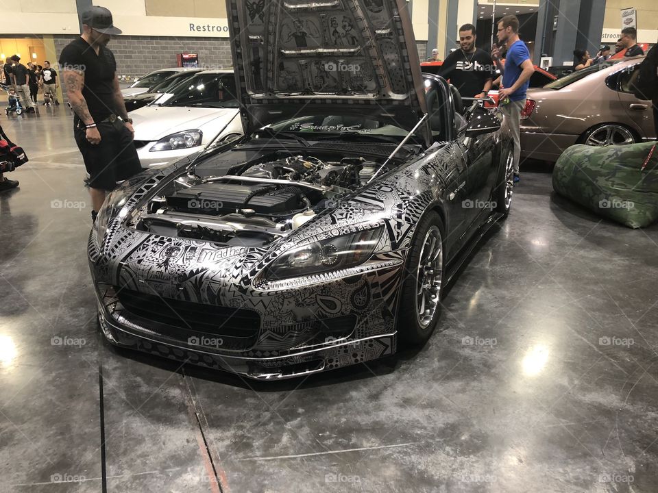 Here is the iconic Honda S2000 but with this build its unique. See those vinyls those are free drawn by a sharpie, crazy right ?